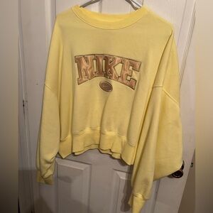 Yellow women’s Nike sweatshirt oversized